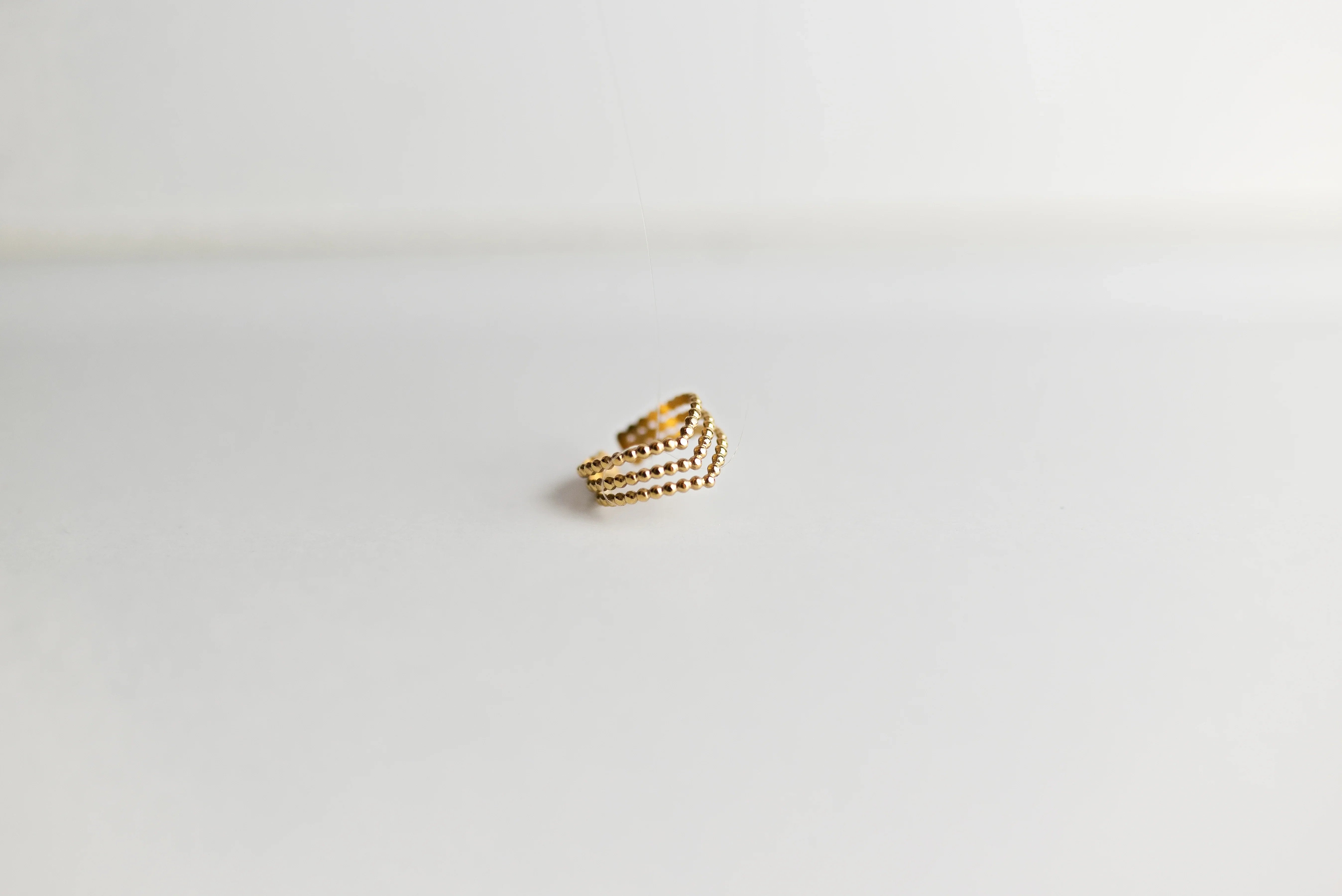 Anillo Triple "Chevron" de Bolitas
